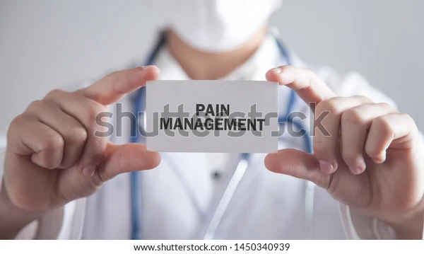 https://www.physiostation.com.my/wp-content/uploads/2022/11/doctor-holding-card-pain-management-600w-1450340939.webp