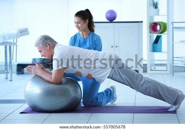 https://www.physiostation.com.my/wp-content/uploads/2022/11/physiotherapist-working-patient-clinic-600w-557005678.webp